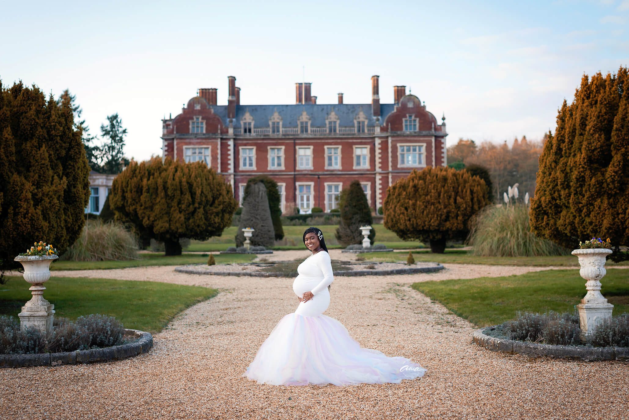 angel in rainbow Ariel gown by the lynford hall by lakenheath maternity photographer