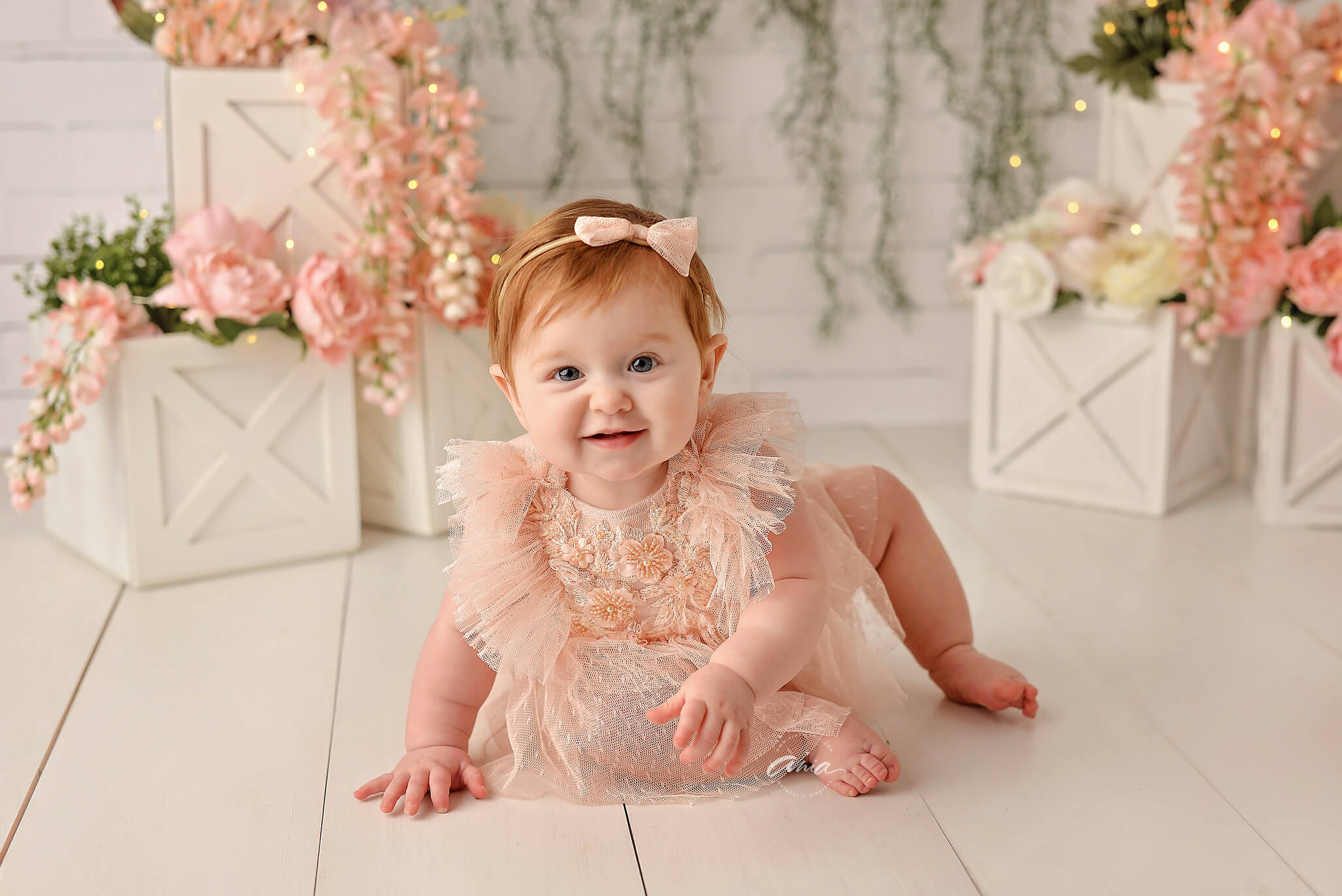 Audrey in pink outfit by lakenheath baby photographer