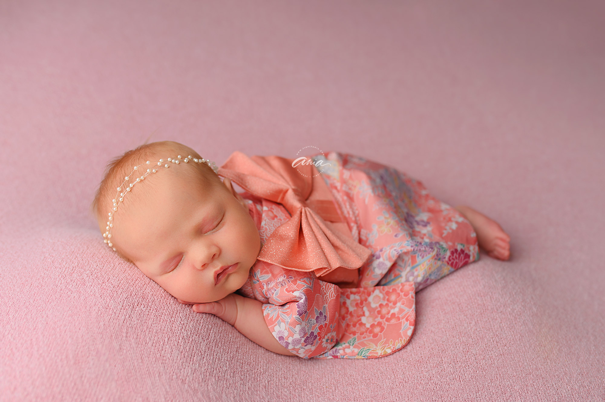 Okinawa newborn baby girl in pink kimono by Simply Ania Photography